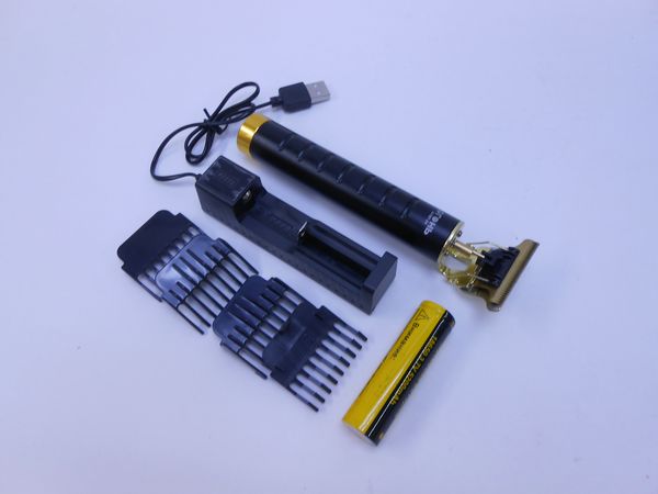 Фото: Триммер для волос Огонь Н-787-24 аккумул.2500mAh,батарея,заряд.устройство,4 насадки